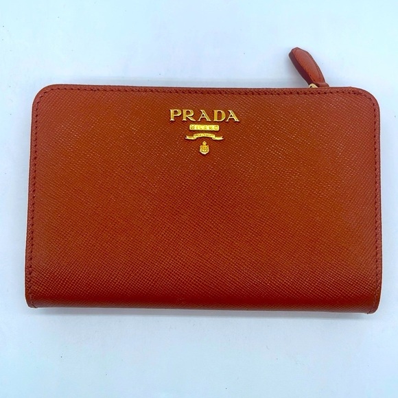 Prada Papaya Orange/ cognac Saffiano leather logo embossed bifold wallet - Picture 1 of 12